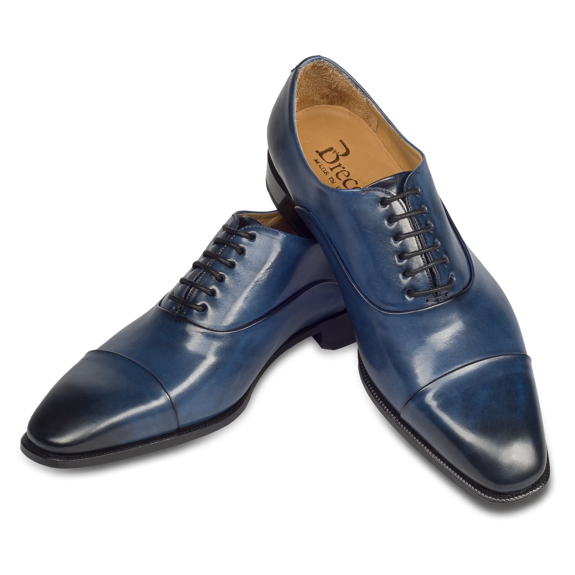 Brecos Anzugschuh,  durchgenähter Captoe Oxford in blau. Ansicht paarweise überkreuzt